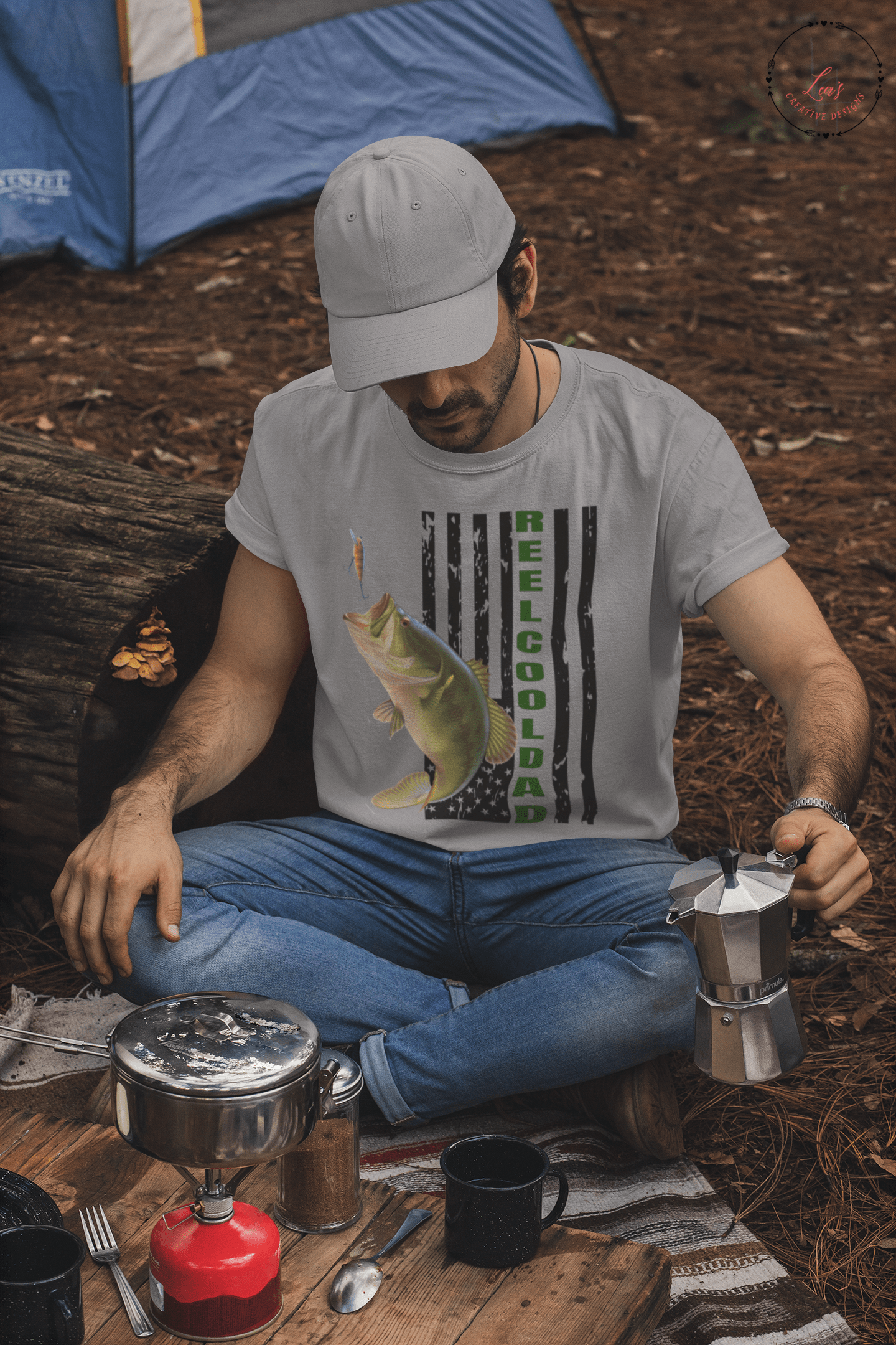 http://leascreativedesigns.com/cdn/shop/products/lea-s-creative-designs-t-shirts-gray-small-reel-cool-dad-with-fish-design-t-shirt-32382875631798.png?v=1679873599